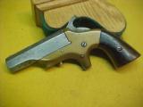 #4556 “Southerner” (Brown Mfg) brass-framed derringer, 41RF. - 1 of 7