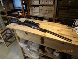 Ruger American Bolt Action Riflein 30-06 Springfield with Scope - 1 of 6
