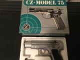 CZ 75b
MATTE STAINLESS..9mm..mint...3 magazines - 3 of 6