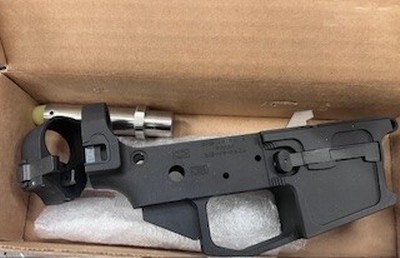 Big Irish Gun Works 9mm side folding lower with extended buffer.