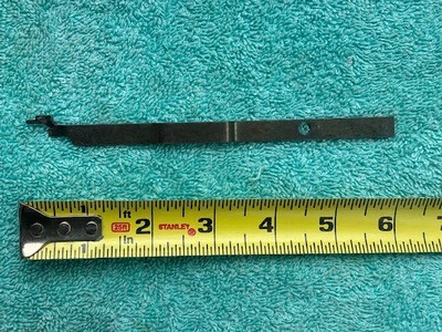 REMINGTON 870 12 GA SHELL LATCH LEFT - Image 1 of 4