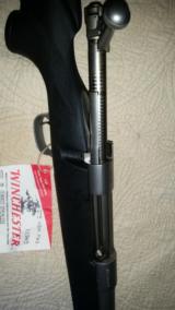 New in box never shot Winchester model 70 bolt action .375
H & H Magnum - 11 of 15