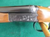 SKB (Oldest Mfg. of Guns) model 280E 20ga.,
(RARE 28