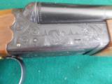 SKB (Oldest Mfg. of Guns) model 280E 20ga.,
(RARE 28