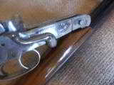 410 Hammer SxS 3" factory nickle, engraved shotgun,
- 9 of 13