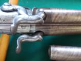 Harris Holland (originator of Holland & Holland) matched set of dualing Percussion Pistols
- 18 of 25