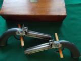 Harris Holland (originator of Holland & Holland) matched set of dualing Percussion Pistols
- 14 of 25