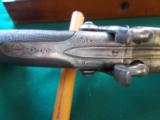 Harris Holland (originator of Holland & Holland) matched set of dualing Percussion Pistols
- 24 of 25
