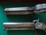 Harris Holland (originator of Holland & Holland) matched set of dualing Percussion Pistols
- 5 of 25