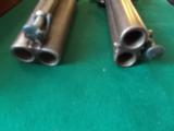 Harris Holland (originator of Holland & Holland) matched set of dualing Percussion Pistols
- 8 of 25