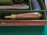 Harris Holland (originator of Holland & Holland) matched set of dualing Percussion Pistols
- 13 of 25