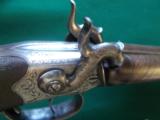 Harris Holland (originator of Holland & Holland) matched set of dualing Percussion Pistols
- 25 of 25