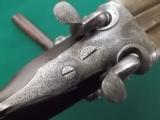 Manton & Co. 10 bore damascus by renound British gunmaker
- 1 of 12