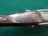 Manton & Co. 10 bore damascus by renound British gunmaker
- 6 of 12