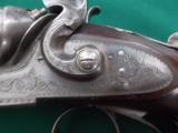 Manton & Co. 10 bore damascus by renound British gunmaker
- 10 of 12