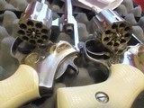 Hi-Standard
pair Sentinel Deluxe Nickel 9 SHOT 22 lr. cal.,
double action revolvers - 6 of 6