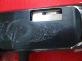Winchester 9422 Hi-Grade Carbine
hand engraved 'Animals- mfg. 2005-06, - 12 of 13