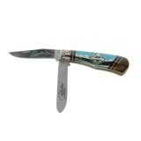 Double-bladed jackknife, handmade by Navajo artist David Yellowhorse.
- 1 of 7