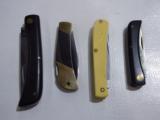 Lot of 4 folding blade knives.
Case P10051L, Case Sodbuster 2138, Case 183, and Case Sodbuster 2137 - 5 of 5