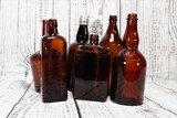 Six Amber Bottles - 1 of 17