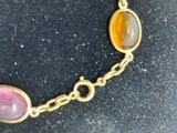 Six different precious stones set in solid 14kt. Gold - 2 of 2
