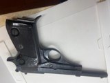 Beretta 71 22lg. Made in Italy. 6" barrel. Looks like it was never fired. 2 factory Mags. One is an extention See many pictures. - 12 of 15