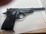 Beretta 71 22lg. Made in Italy. 6" barrel. Looks like it was never fired. 2 factory Mags. One is an extention See many pictures. - 13 of 15