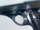 Beretta 71 22lg. Made in Italy. 6" barrel. Looks like it was never fired. 2 factory Mags. One is an extention See many pictures. - 3 of 15
