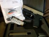 Kahr 9MM PM9 Semi-Auto Pistol with LaserMax sight.
Like new with 3X magazines and original papers and receipts. - 4 of 7