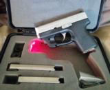 Kahr 9MM PM9 Semi-Auto Pistol with LaserMax sight.
Like new with 3X magazines and original papers and receipts. - 2 of 7