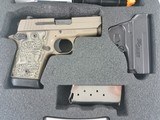 Sig Sauer P938 Scorpion
938-9-SCPN Used - 1 of 3