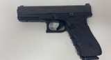 Glock 17 Gen 4 with one 17 rd. magazine and Trijicon night sights - 1 of 11
