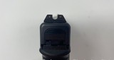 Glock 17 Gen 4 with one 17 rd. magazine and Trijicon night sights - 9 of 11