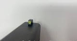 Glock 17 Gen 4 with one 17 rd. magazine and Trijicon night sights - 10 of 11