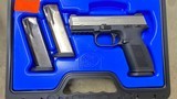 Used FN FNS-40 40 S&W Black/Stainless 3-14 rd Mags w/ Safety - 1 of 1