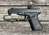 Used Glock 45 9mm W/ Trijicon RMR & Radian Afterburner Ramjet - 2 of 4