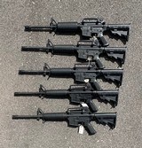 One (1) Police Trade Bushmaster XM15-E2S 556 Nato 16