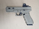 Used Glock 22 Gen 4
FDE .40 Night Sights MOS Optic Ready Ameriglo Trijicon RMR Red Dot Window Cuts - 2 of 3