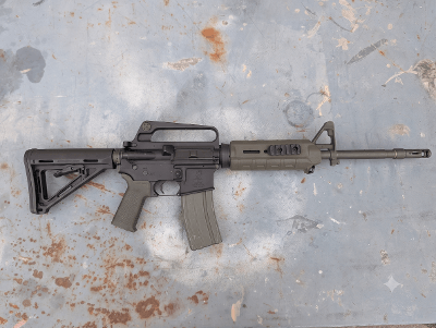 Used Bushmaster XM15-E2S 5.56 NATO 16