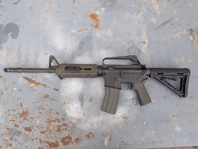Used Bushmaster XM15-E2S 5.56 NATO 16