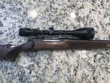 REMINGTON 700 RIFLE 30-06, SIMMONS 4X12 SCOPE, MONTE CARLO STOCK, IMPRESSIVE. MFG 1994 - 9 of 14