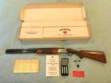 RUGER RED LABEL 12 GAUGE WITH BOX, PAPERWORK, AND CHOKES, EXCELLENT - 1 of 15