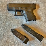 GLOCK 27 PISTOL 40 CAL 11 RD & 15 RD MAGS & HOLSTER - 1 of 12
