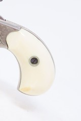 ENGRAVED Antique COLT “NEW LINE” .22 Rimfire ETCHED PANEL Pocket Revolver
Factory Engraved, Nickel, Nitre Blue, Ivory Grips - 3 of 18