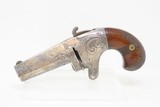 SCARCE Antique NATIONAL ARMS No. 2 .41 Cal. Rimfire SPUR TRIGGER Deringer
Nicely Engraved NICKEL FRAME Pre-Colt Pistol - 2 of 16