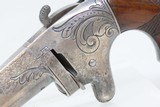 SCARCE Antique NATIONAL ARMS No. 2 .41 Cal. Rimfire SPUR TRIGGER Deringer
Nicely Engraved NICKEL FRAME Pre-Colt Pistol - 4 of 16
