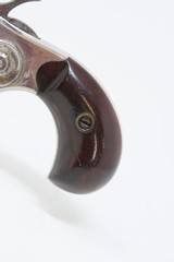 CASED Antique 7-Shot COLT NEW LINE .22 Caliber RF ETCHED PANEL Revolver
Engraved to Dealer WILLIAM KAVANAGH & SON - 6 of 21