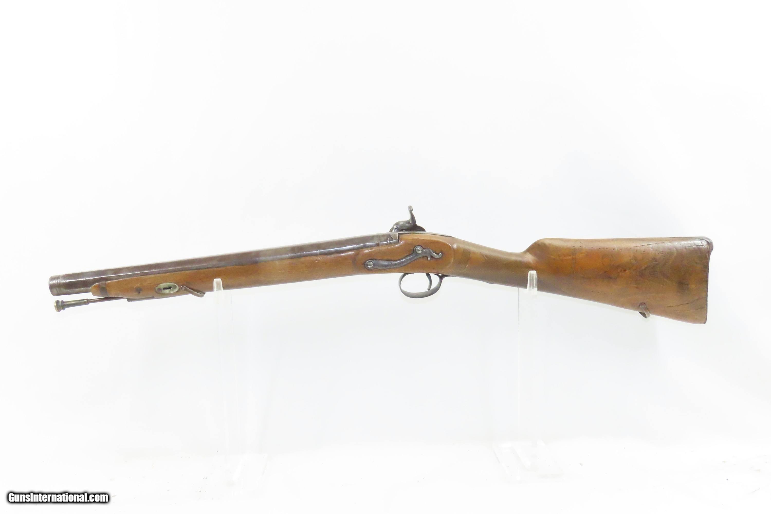 A richly worked brass mounted flint shotgun with Spanish marks, 18th C. -  Coronari Auctions