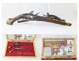 BOXED SET of Antique FLINTLOCK PISTOLS with a REVOLUTIONARY WAR THEME Two Ornate Pistols with a Stag Handled Knife