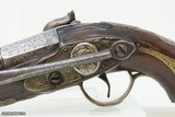 SPANISH PATILLA MIQUELET Pistol w Belt Hook & Bust Décor .69 cal
Engraved Early-19th Century Carved Miquelet Conversion Pistol - 15 of 16